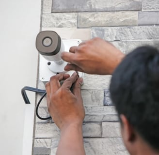 handyman installing security camera Squamish