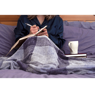 Person feeling empowered after an online mindfulness for migraine support session