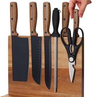 Space-saving magnetic knife holder for easy access and clutter-free kitchen organization.