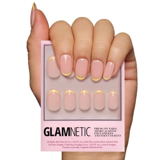 a person holding a card with a card that says glamineticticc