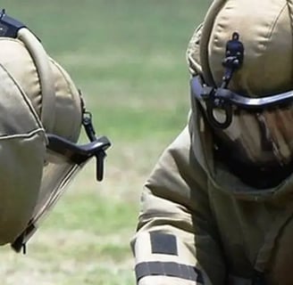 A Russian bomb squad defusing an explosive device