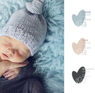 Cute and gentle Logo and Brand Identity for baby store Mommy's Hero, color palette, newborn baby on a soft blue karpet