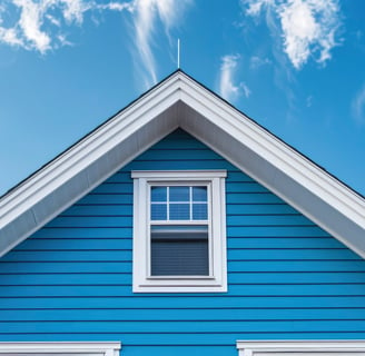 House with blue vinyl siding