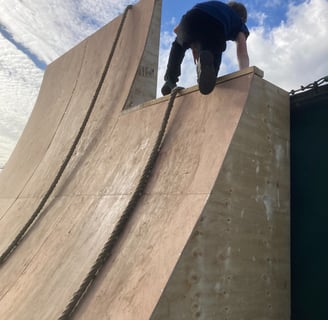a man on a skateboard on a ramp