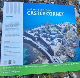 a sign that says "Castle Cornet"