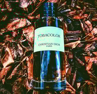 Dior Tobacolor bottle on tobacco leaves