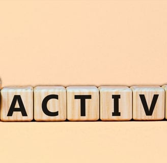 wooden blocks with the word changing from reactive to proactive