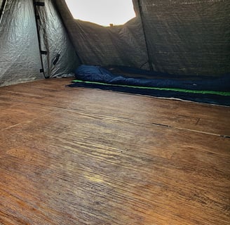 The interior of a fold-out truck camper