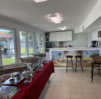 a buffet table with a buffet table set up for a buffet