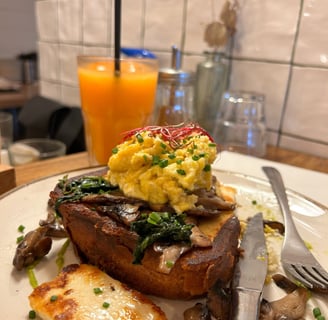 a plate of food with a fork and knife on it