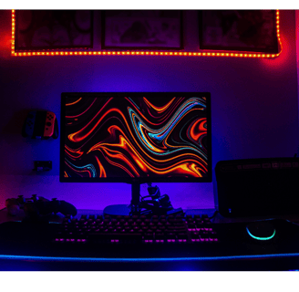 a gaming computer setup with a gaming computer keyboard and mouse