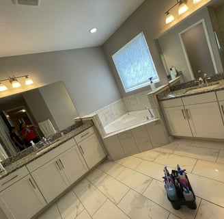 a bathroom with a tub and a sink