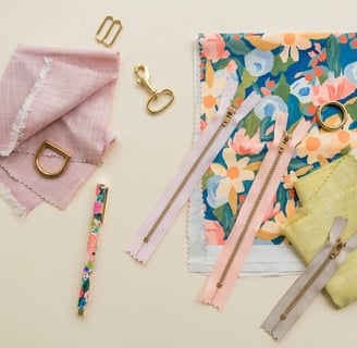 a bunch of sewing supplies on a table