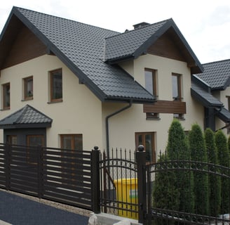 a house with a fenced in area with a fenced in area