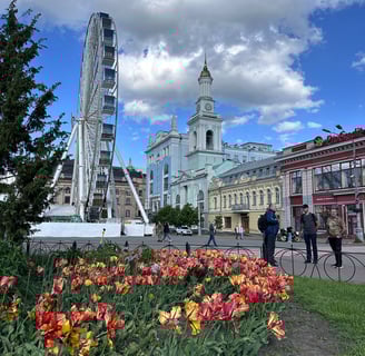 a ferris wheel with a ferris wheel in the background