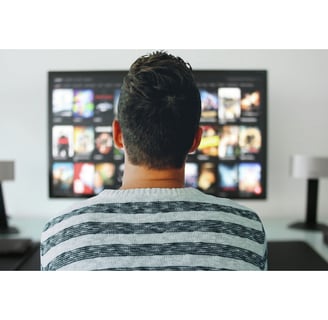 man watching tv .