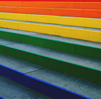 colorful painted steps leading up to a colorful painted staircase