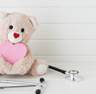 a teddy bear with a heart and stethoscope