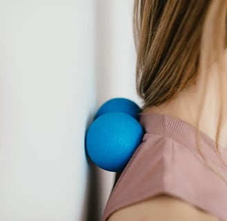 a woman with a blue hair tie around her neck