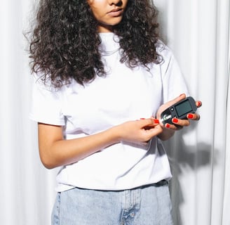 a woman in a white shirt and jeans jeans