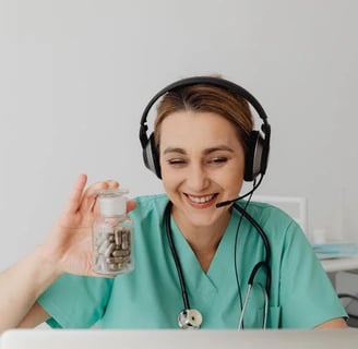 a nurse in a green scrub scrubsuit with a jar of pills