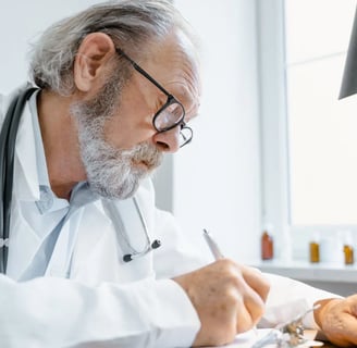 a doctor in a white coat and a stethrobe