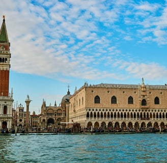 a large building with a clock tower in the middle of it