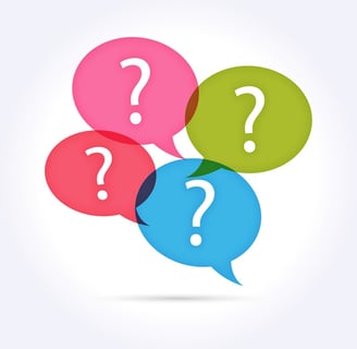 Four questions marks bubbles on a white background