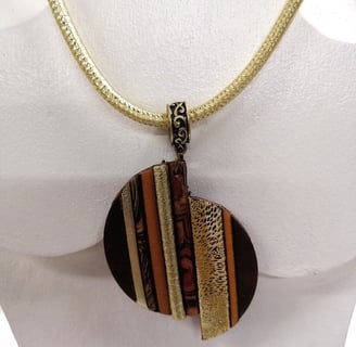 a necklace with a striped necklace on a mannequin