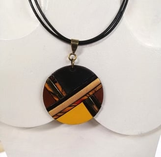 a necklace with a black and yellow necklace