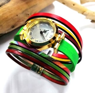 a wrist watch with a colorful colored leather bracelet