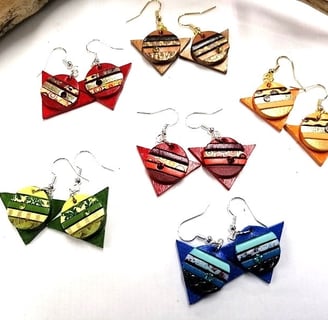 a group of earrings with a variety of earrings