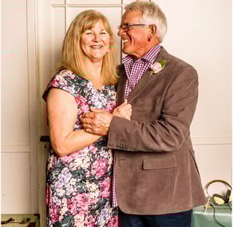 husband and wife hugging
