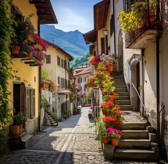 a narrow street with a bunch of flowers in the middle of the street