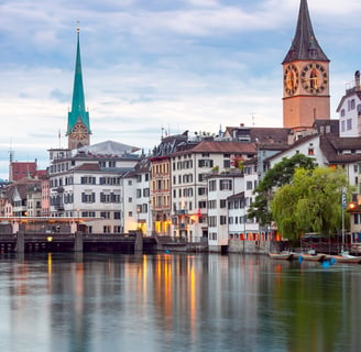 a cityscape of buildings and a clock tower