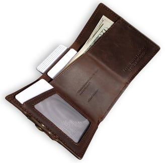 a wallet with a credit card and a credit card