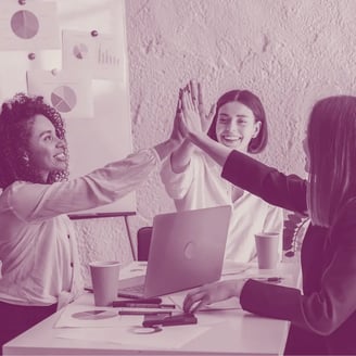 Women giving high fives for Accountability