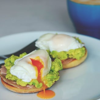 Mashed Avocado with English muffins and poached eggs