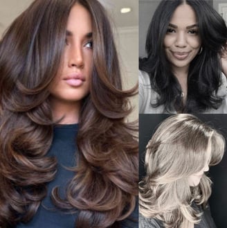 a woman with long hair and a black top