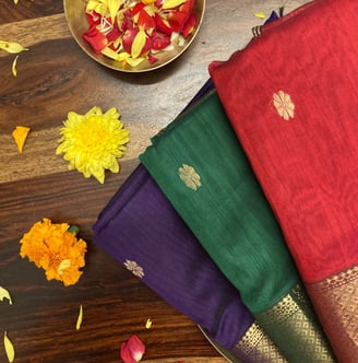 handwoven Maheshwari saree in silk-cotton blend, with zari borders and traditional motifs