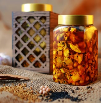 a jar of dried nuts in a jar with a spoon and spoon