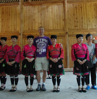 Nick Billington with traditional long haired women at Huangluo Yao Village, China