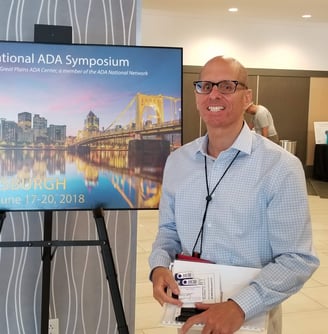 Photo of david D'Arcangelo about to present at the national ADA Symposium