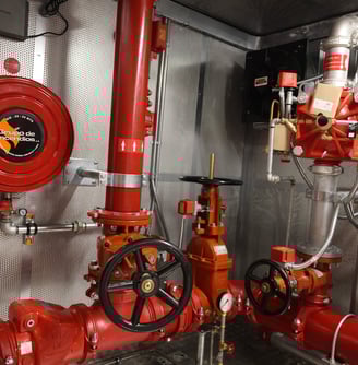a fire hydrant with a red fire hydrant and a red fire hydrant