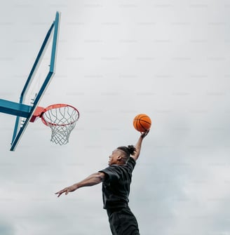 Player trying to dunk the basketball