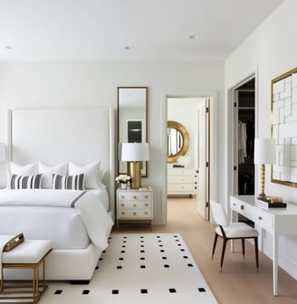 a bedroom with a white bed and a white bed