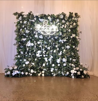 Wedding ceremony with the rose garden flower wall