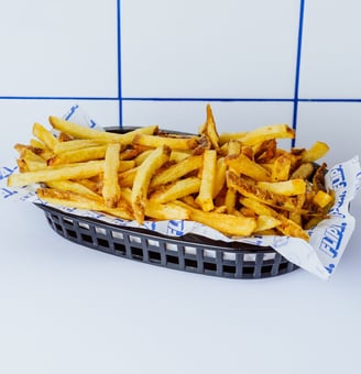 Patatas fritas caseras de Flipa, crujientes, doradas y cortadas a mano diariamente