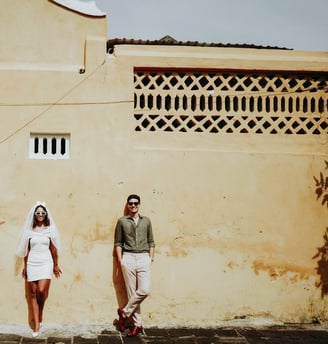 a man and woman standing next to each other