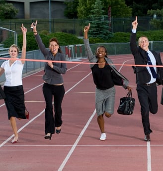 a group of business people running on a track